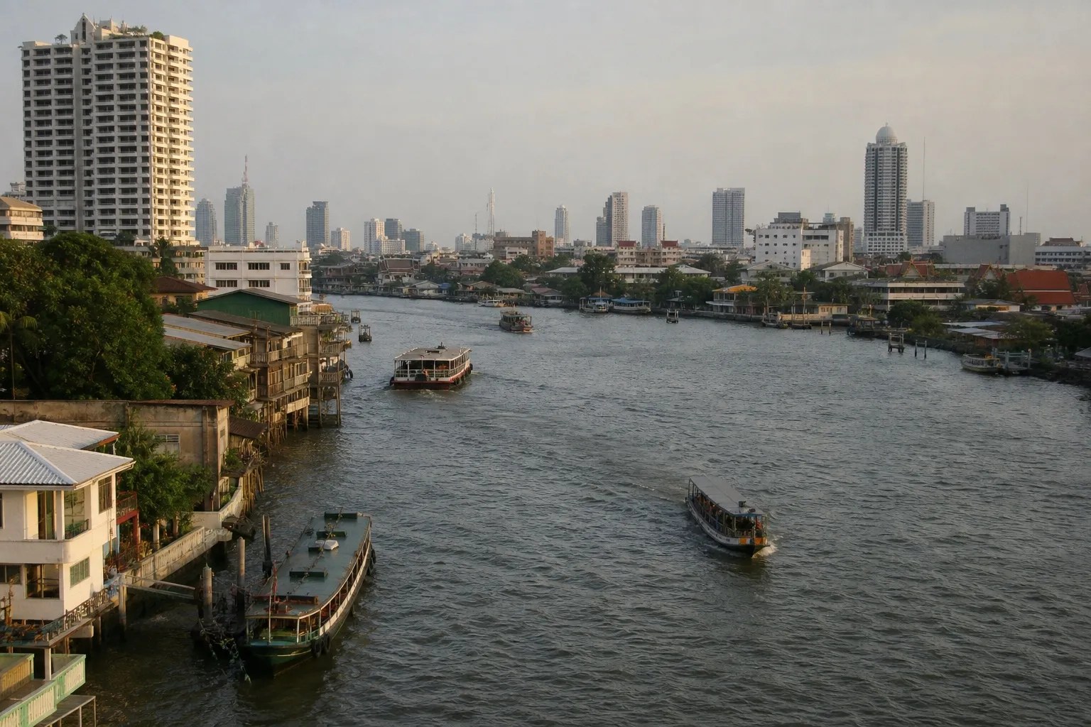 Ferries crossing the Chao Phraya River through Bangkok's riverside cityscape
