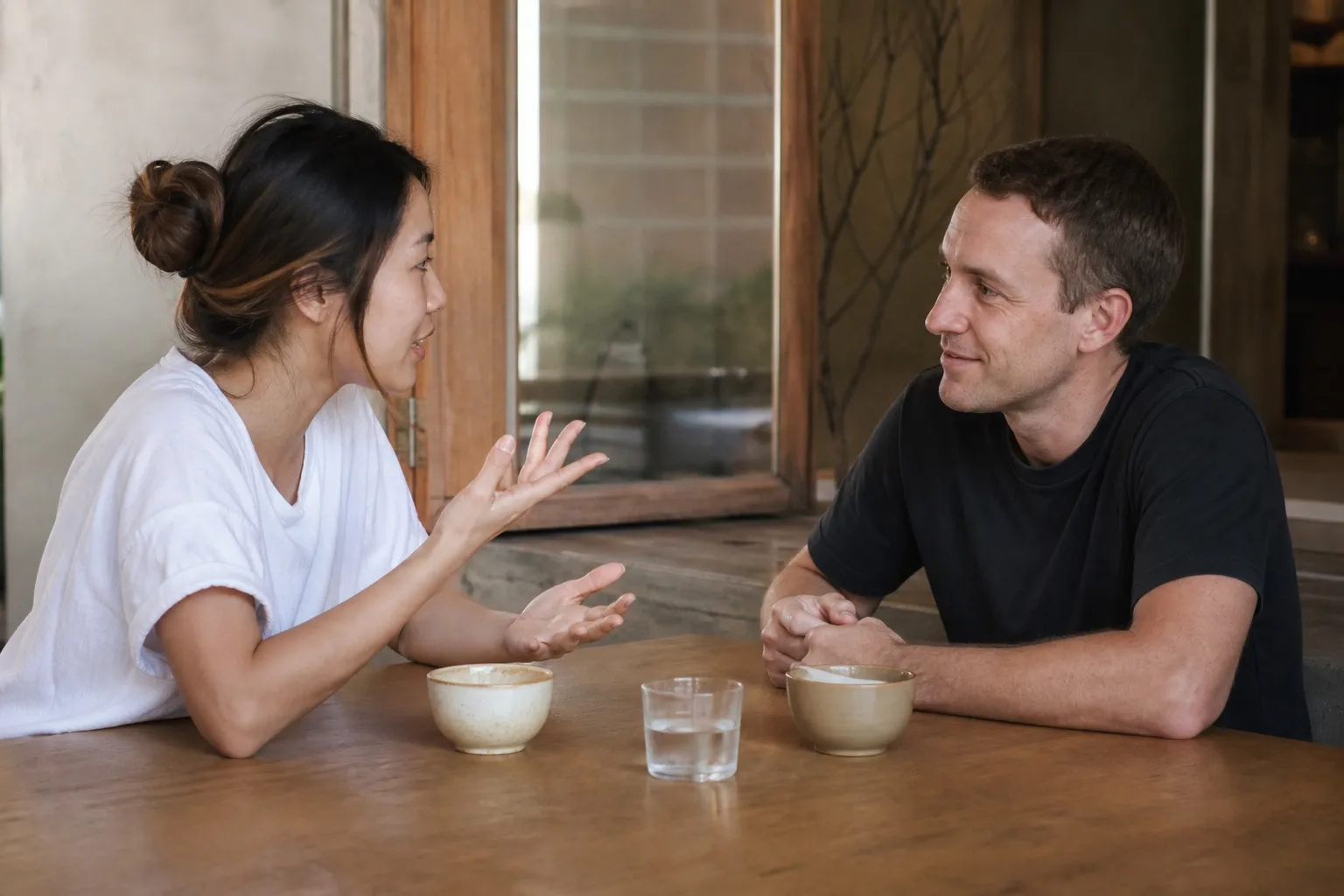 Learner practising Thai with notes and audio
