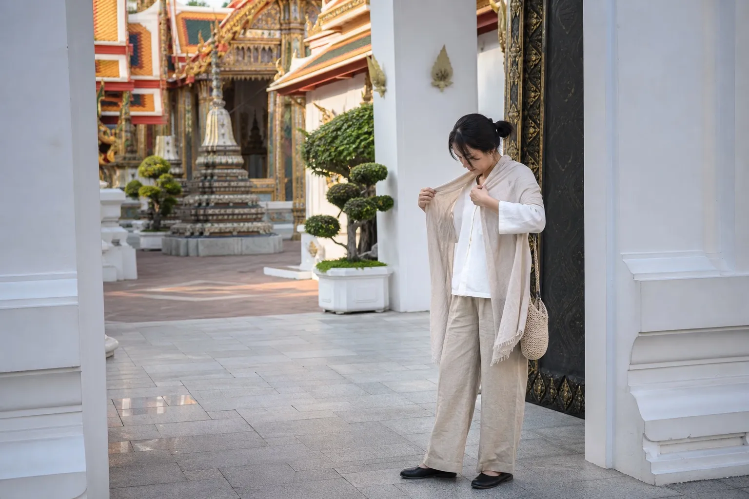 Visitor wearing respectful clothing at a Thai temple